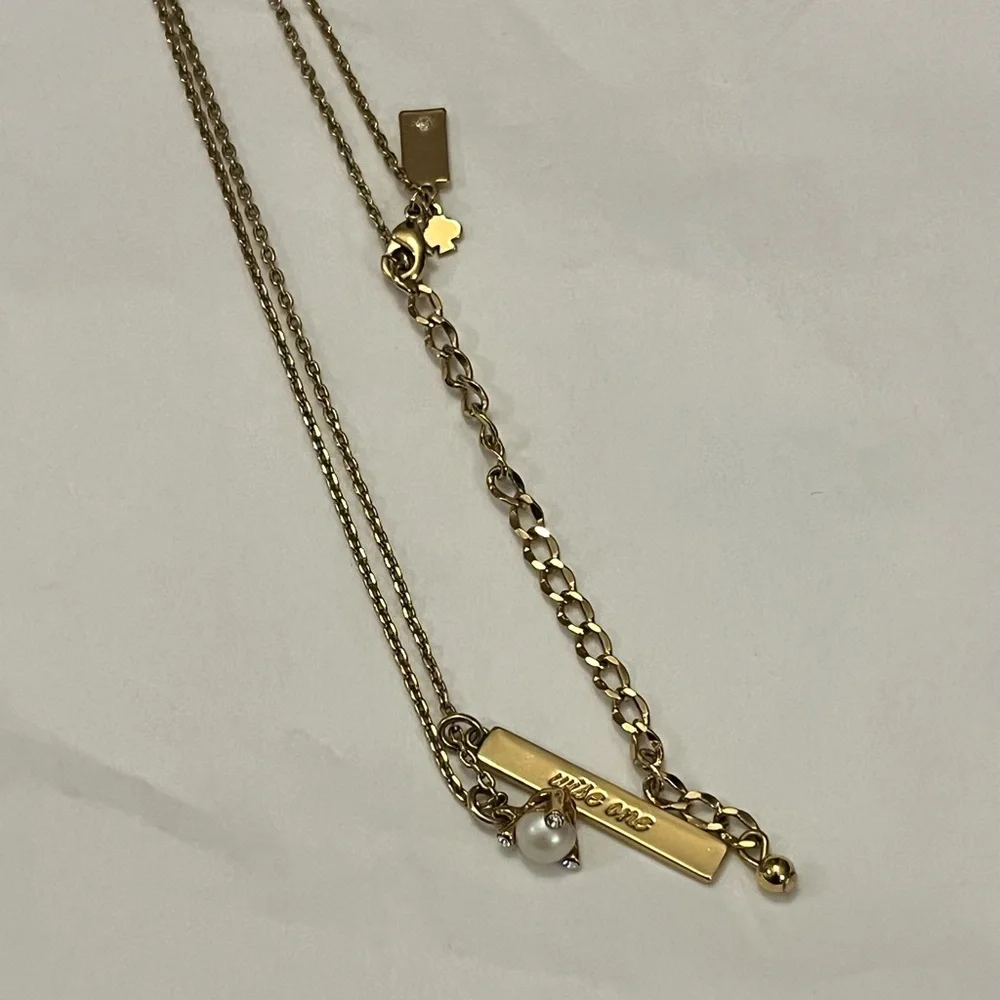Kate Spade New York Gold-Tone Born To Be Wise One Cream Pendant Necklace